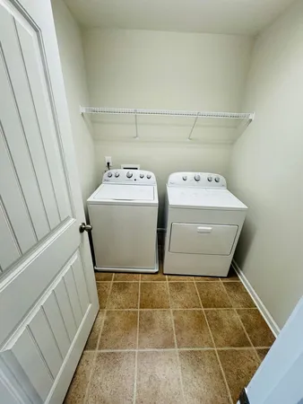 a bathroom with a sink toilet and mirror