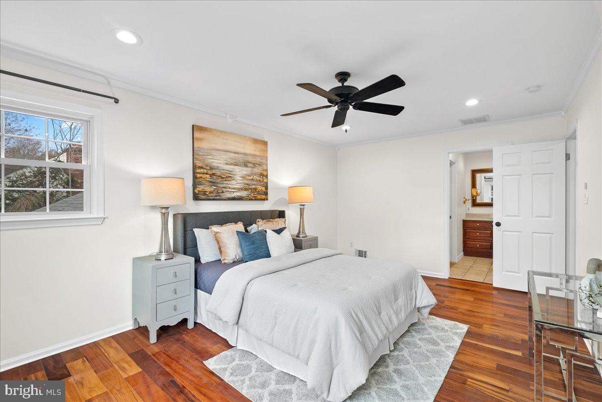 7596 Ruxton Drive Springfield, VA 22153 - Photo 20 of 40 a bed room with a bed and a window