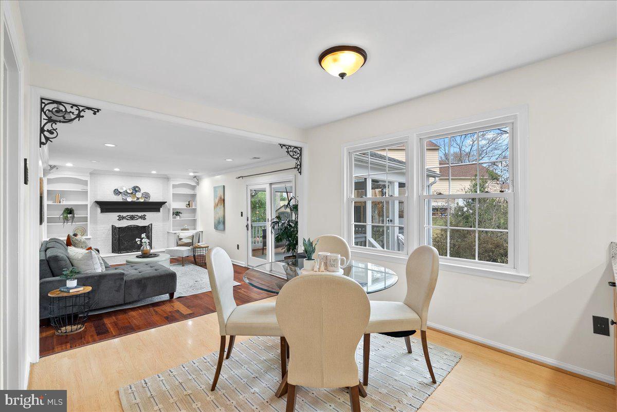 7596 Ruxton Drive Springfield, VA 22153 - Photo 3 of 40 a view of a dining room with furniture window and wooden floor