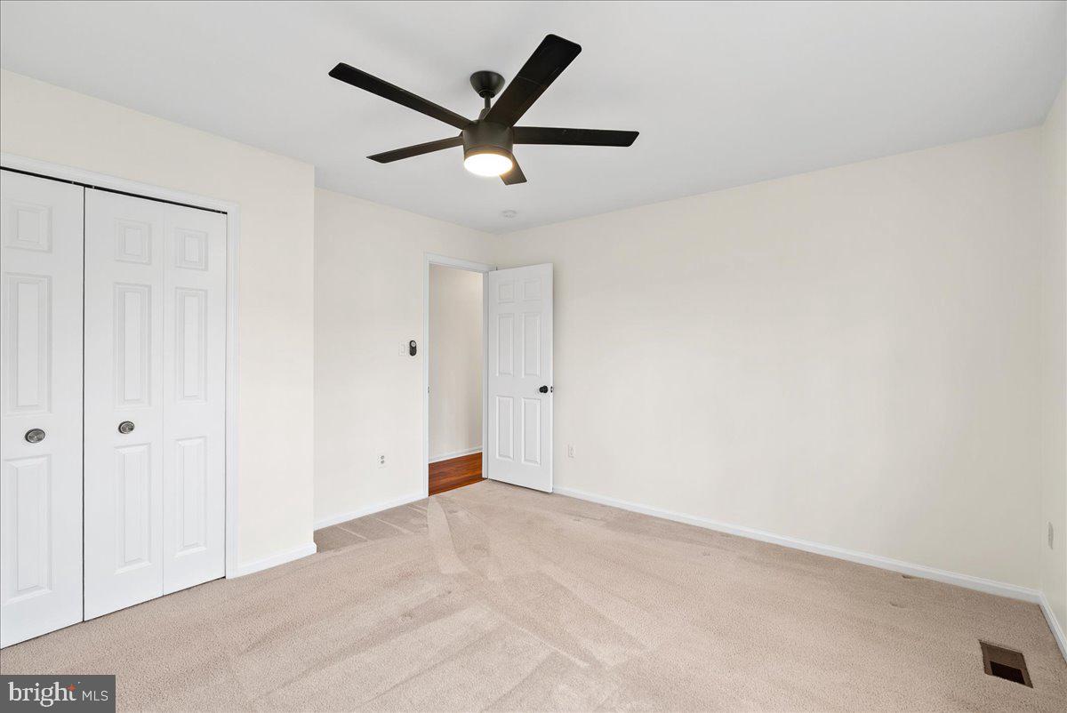7596 Ruxton Drive Springfield, VA 22153 - Photo 31 of 40 wooden floor in an empty room