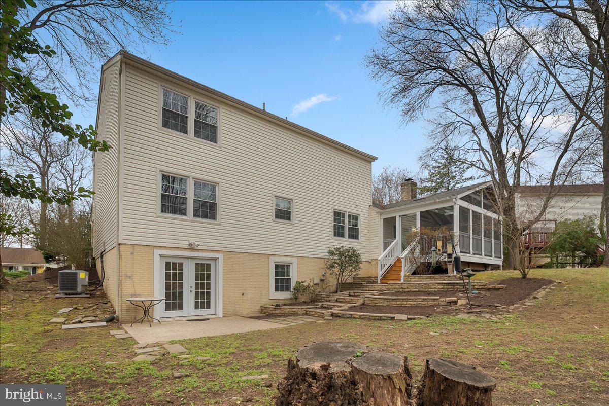 7596 Ruxton Drive Springfield, VA 22153 - Photo 38 of 40 a front view of a house with swimming pool