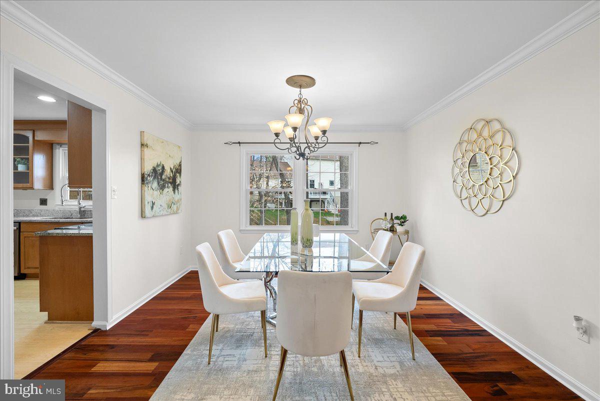 7596 Ruxton Drive Springfield, VA 22153 - Photo 8 of 40 a dining room with furniture and window