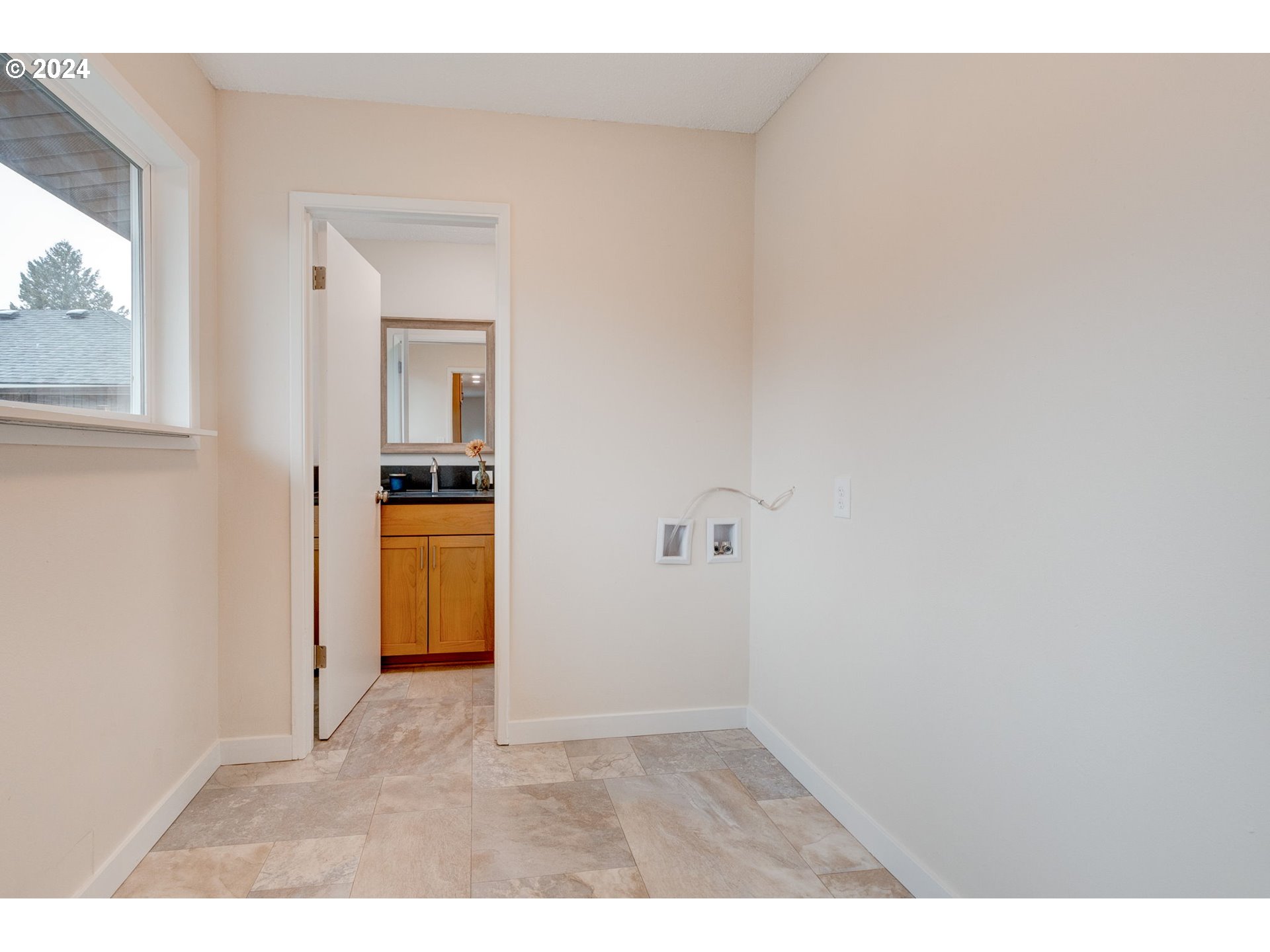 8815 Southwest 69th Avenue Portland, OR 97223 - Photo 24 of 36 a view of empty room with wooden floor