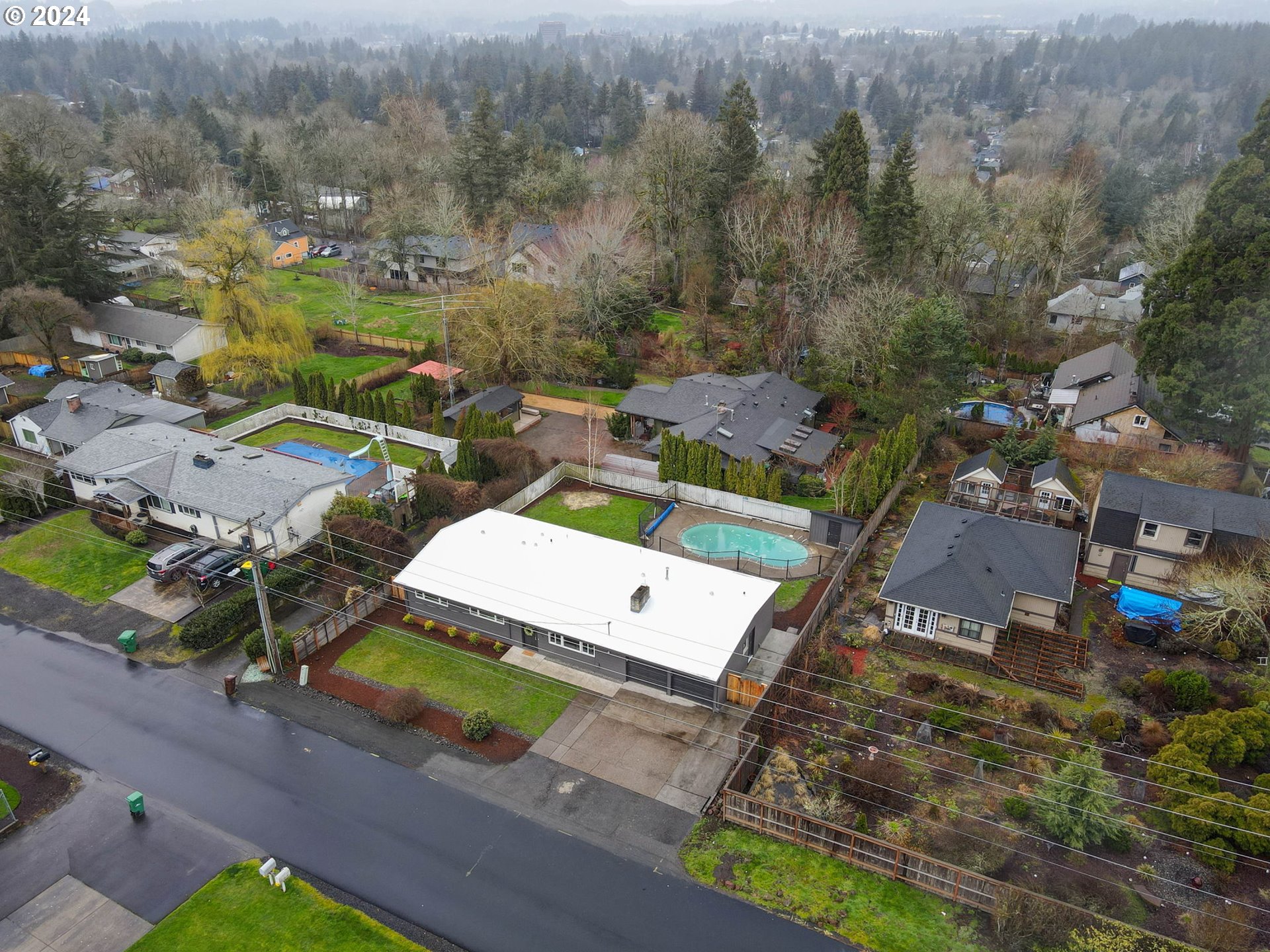 8815 Southwest 69th Avenue Portland, OR 97223 - Photo 34 of 36 an aerial view of a house with a garden