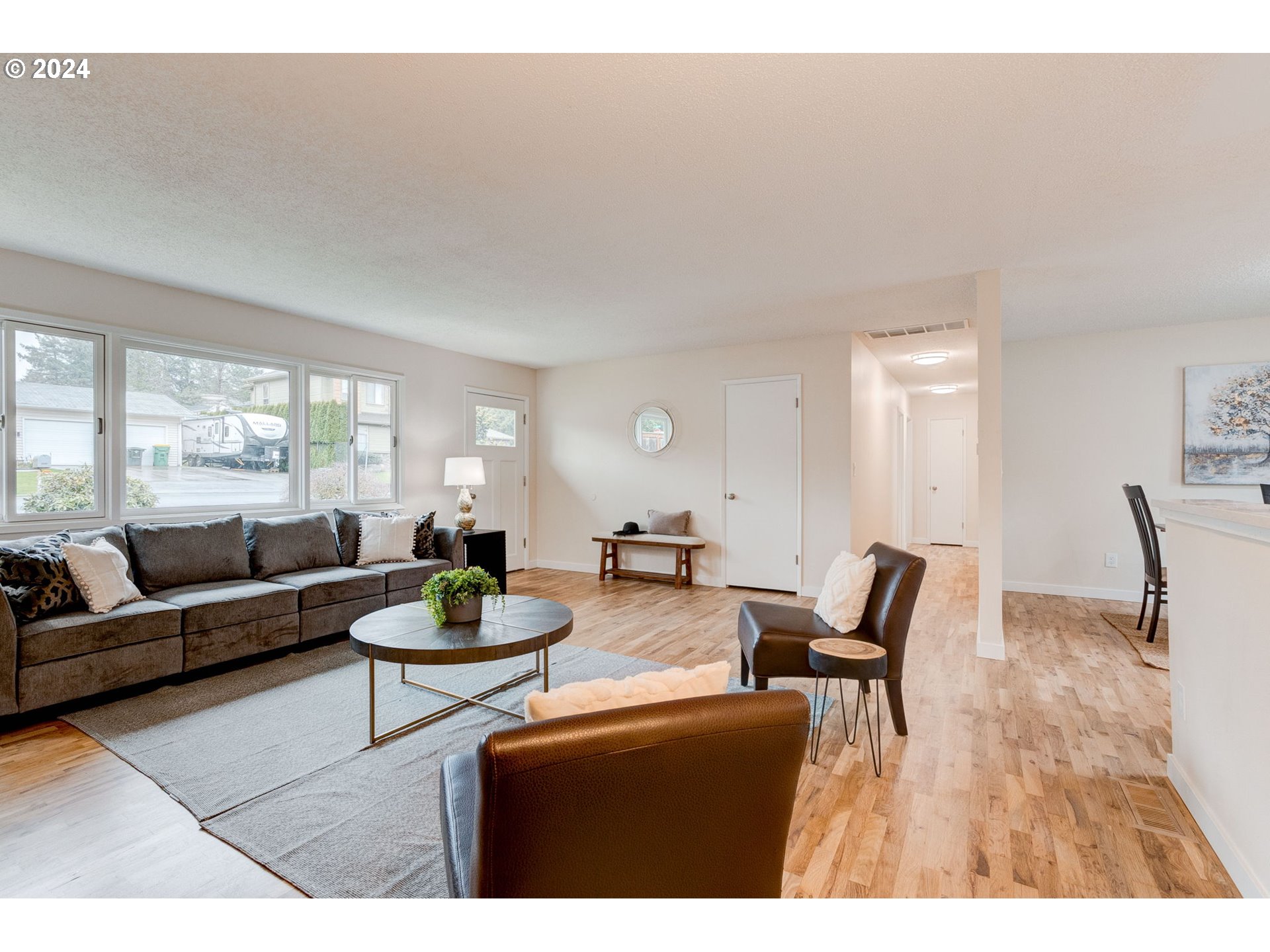 8815 Southwest 69th Avenue Portland, OR 97223 - Photo 4 of 36 a living room with furniture and wooden floor
