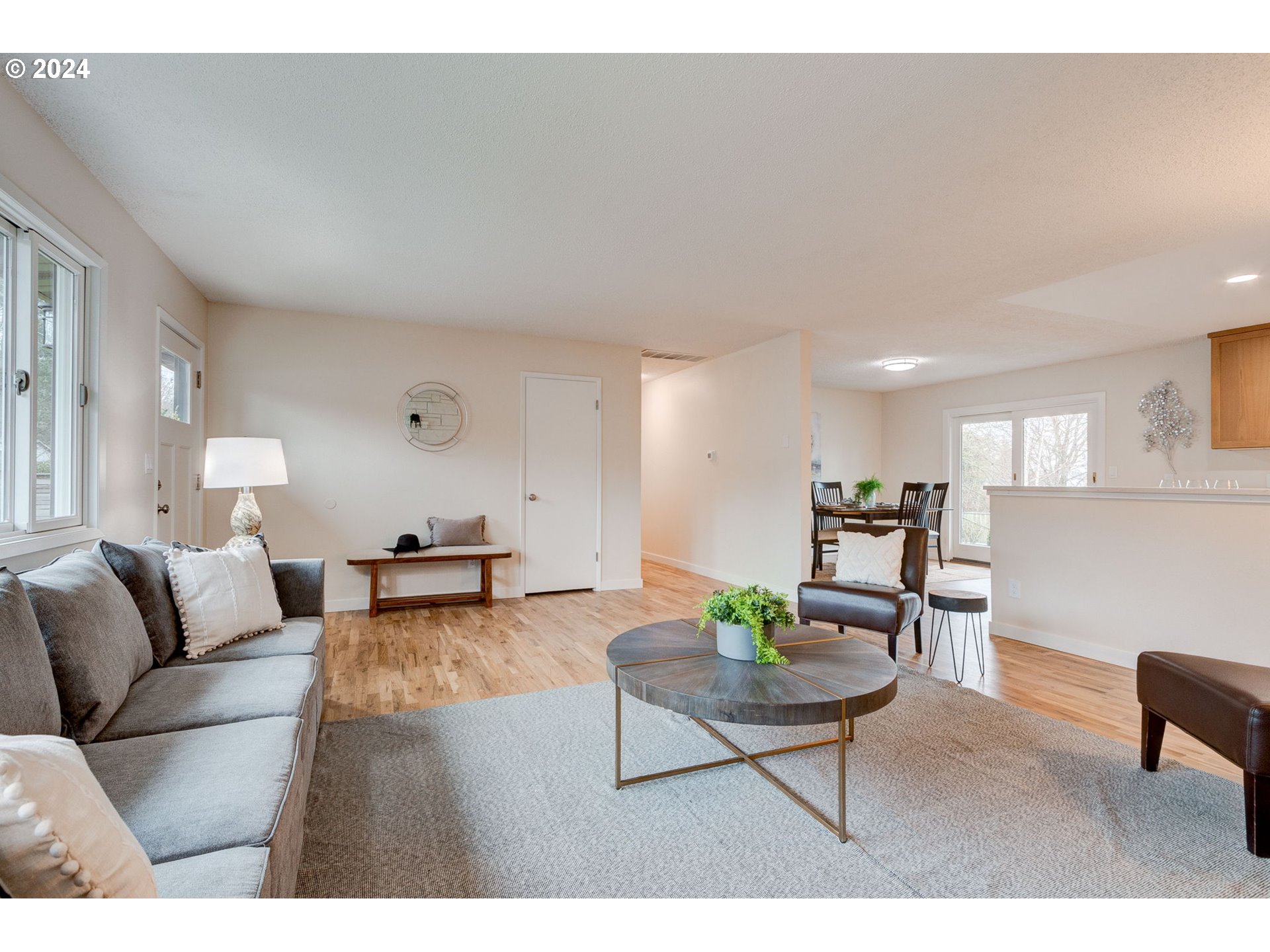 8815 Southwest 69th Avenue Portland, OR 97223 - Photo 6 of 36 a living room with furniture and a table