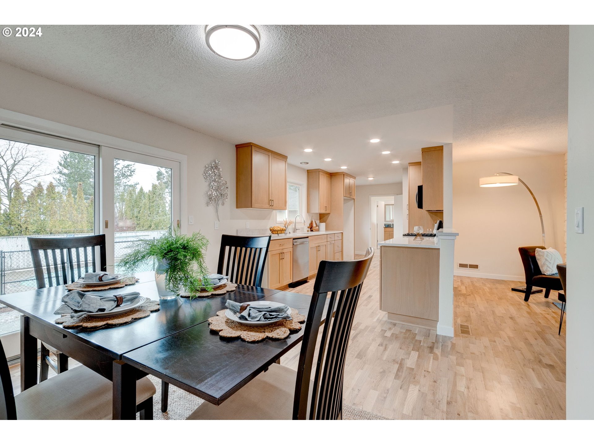 8815 Southwest 69th Avenue Portland, OR 97223 - Photo 8 of 36 a view of a dining room with furniture