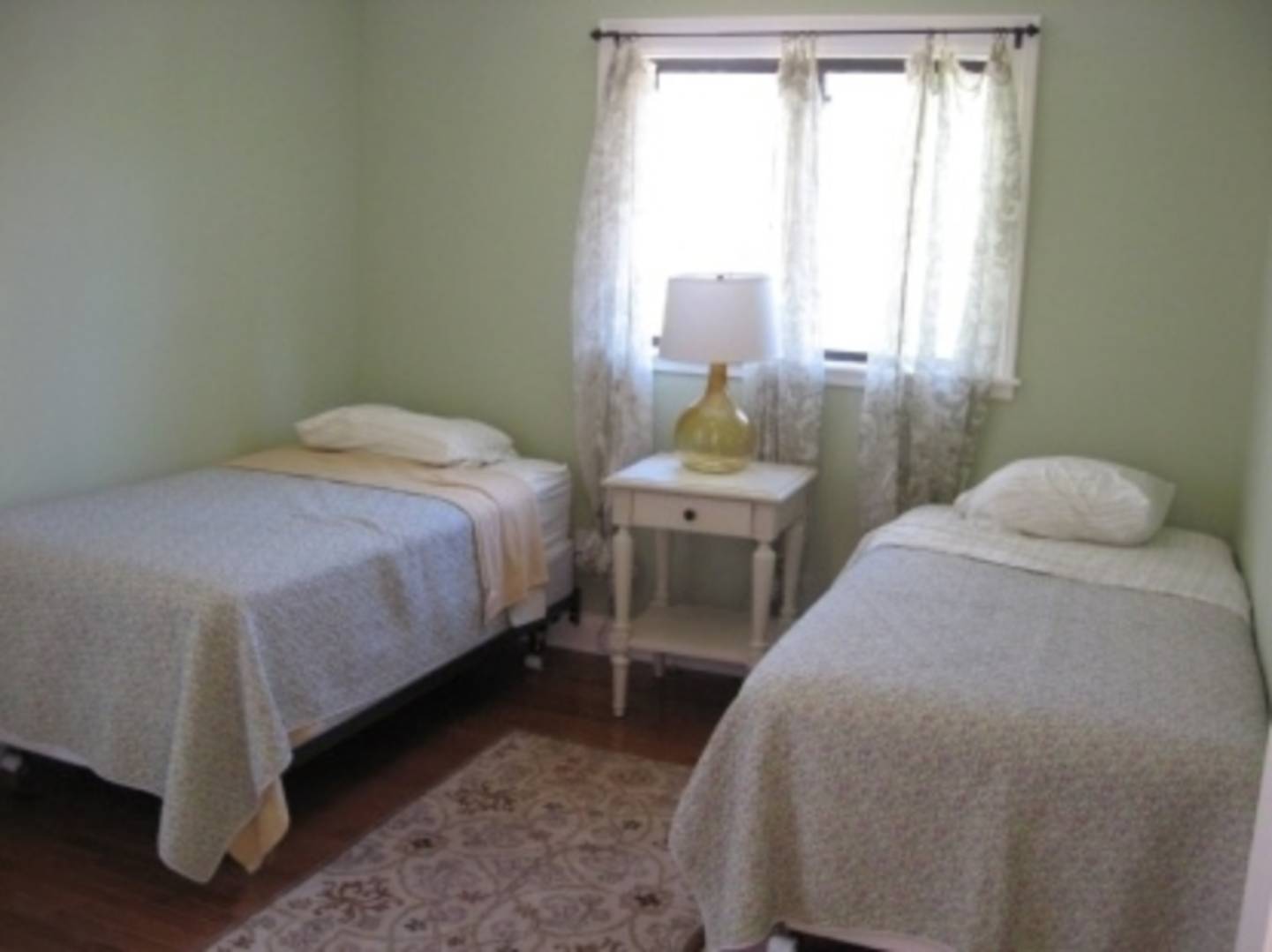 13 Diane Drive East Hampton, NY 11937 - Photo 6 of 7 a bedroom with a bed and window