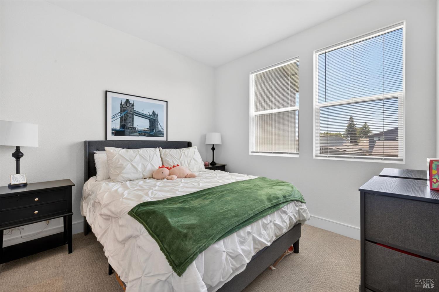 2215-2217 Versaro Drive Santa Rosa, CA 95403 - Photo 33 of 45 a bedroom with a bed and a window