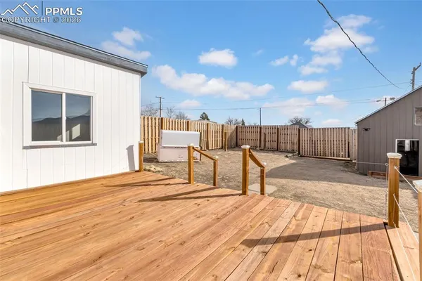 a view of a terrace with wooden floor