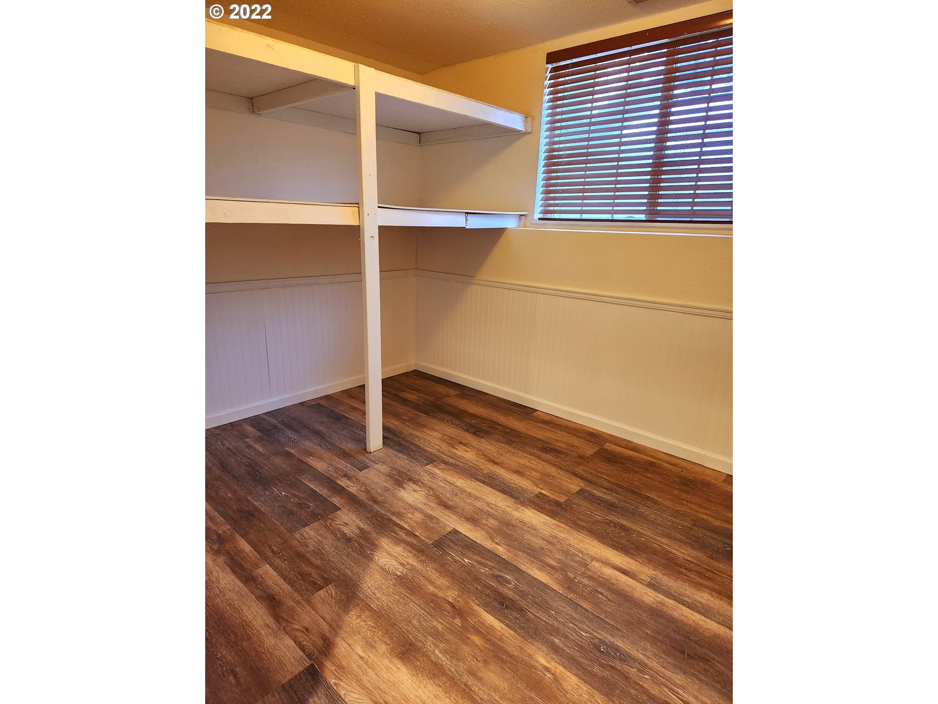 3785 Southwest Marshall Place Pendleton, OR 97801 - Photo 13 of 20 a view of an empty room with wooden floor