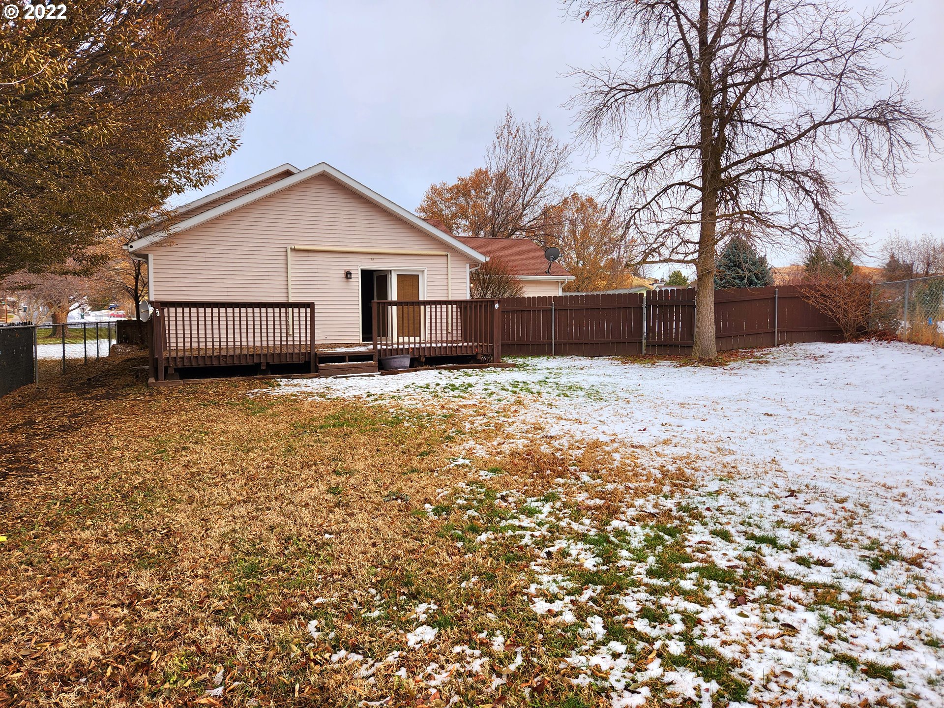 3785 Southwest Marshall Place Pendleton, OR 97801 - Photo 19 of 20 a view of a house with a yard covered in snow