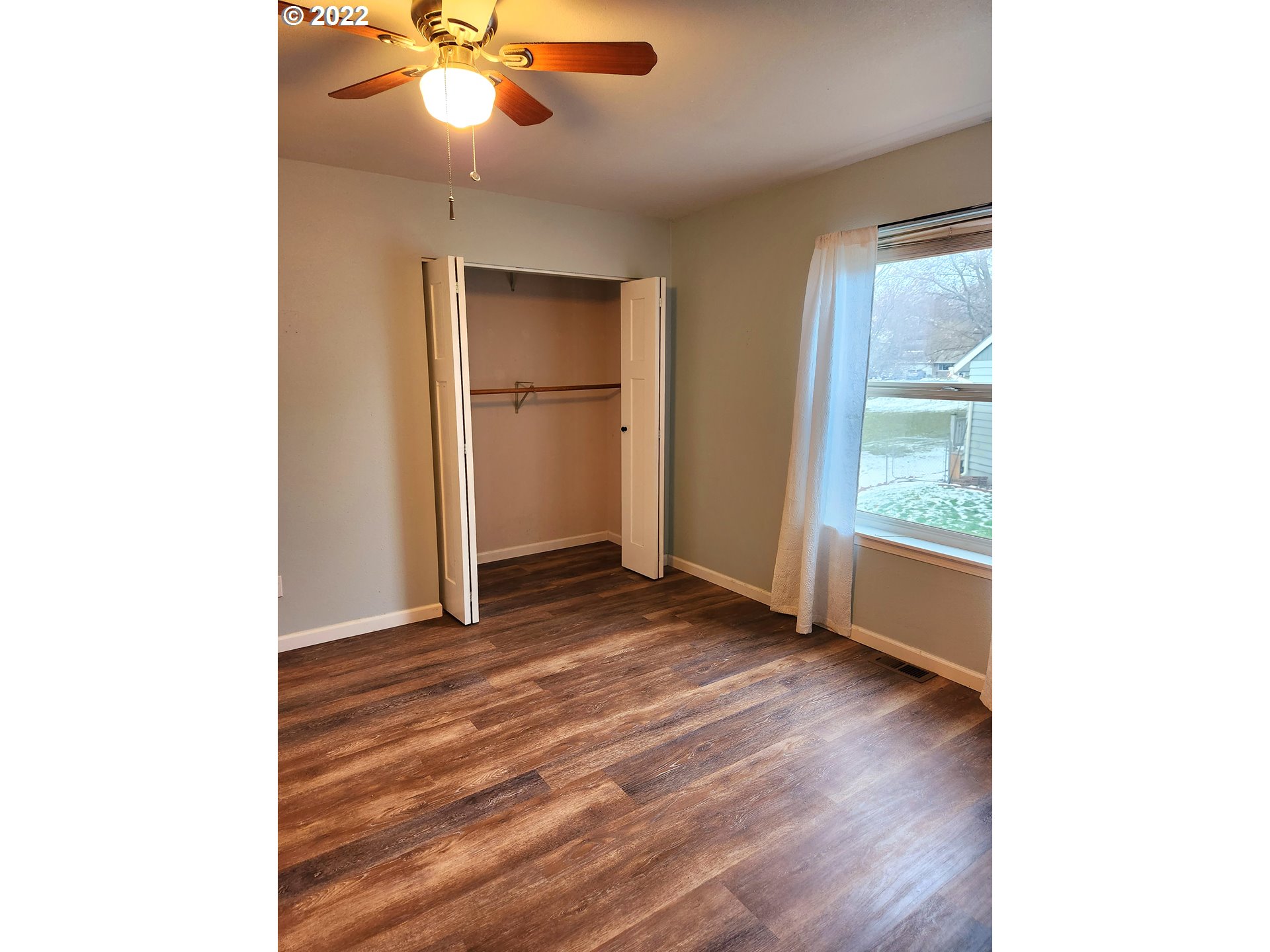 3785 Southwest Marshall Place Pendleton, OR 97801 - Photo 8 of 20 a view of an empty room with a window