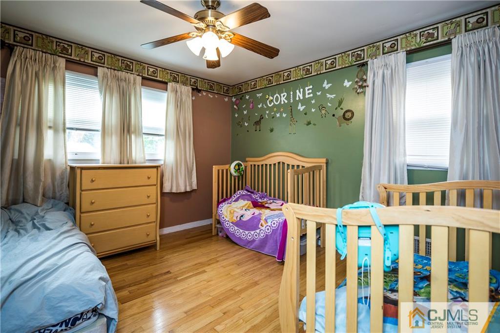 26 Peake Road Edison, NJ 08837 - Photo 14 of 23 a bedroom with a bed and a window