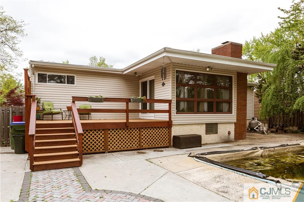 26 Peake Road Edison, NJ 08837 - Photo 3 of 23 a view of a house with a balcony