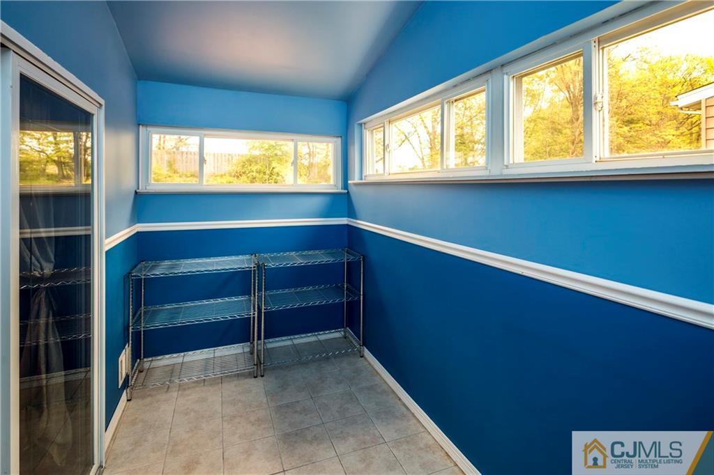 26 Peake Road Edison, NJ 08837 - Photo 21 of 23 a view of an empty room with a window