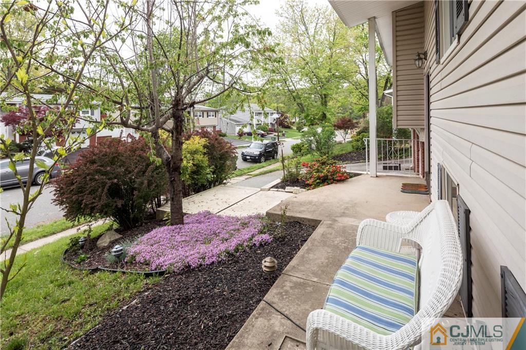 26 Peake Road Edison, NJ 08837 - Photo 4 of 23 a view of a backyard with sitting area