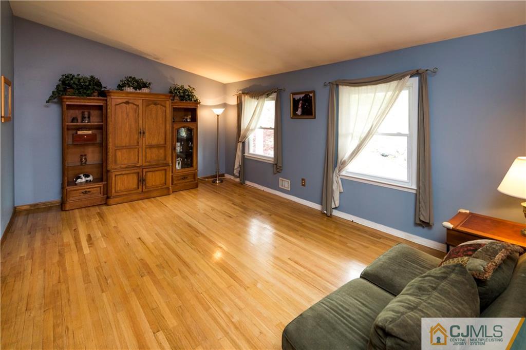 26 Peake Road Edison, NJ 08837 - Photo 5 of 23 a bed room with a bed and a window