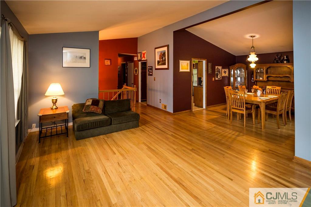 26 Peake Road Edison, NJ 08837 - Photo 6 of 23 a living room with furniture and a table
