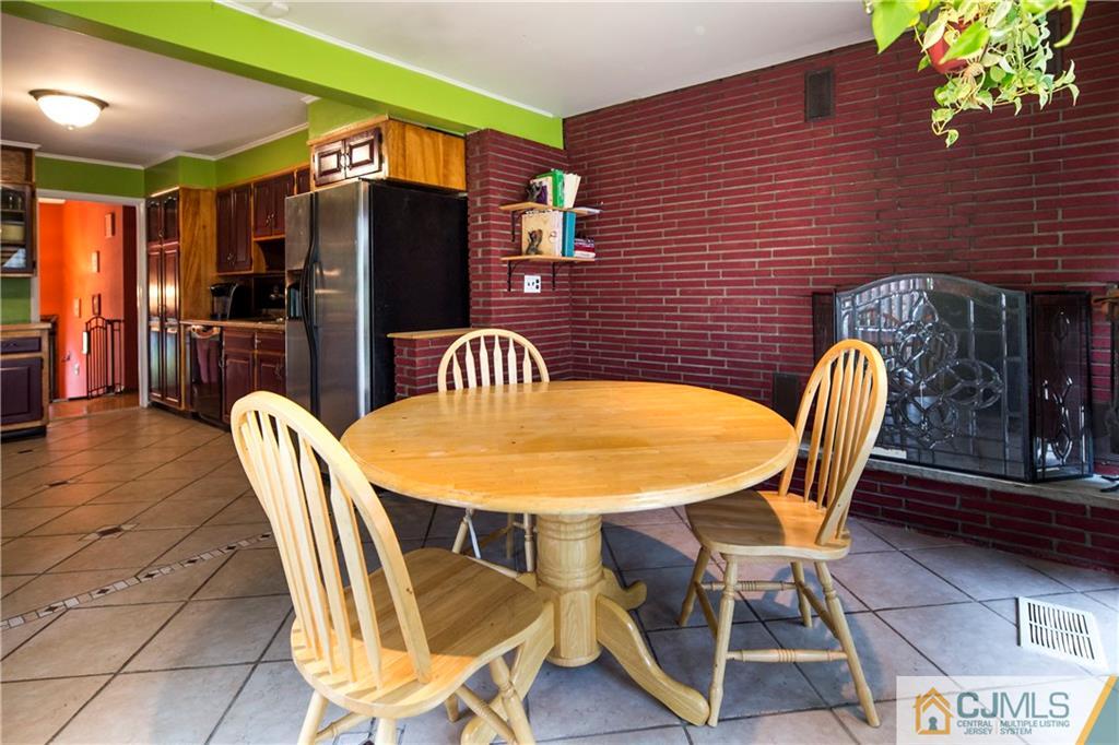 26 Peake Road Edison, NJ 08837 - Photo 10 of 23 a outdoor dining space with furniture and outdoor view