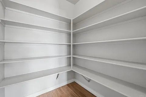 a view of an empty walk in closet