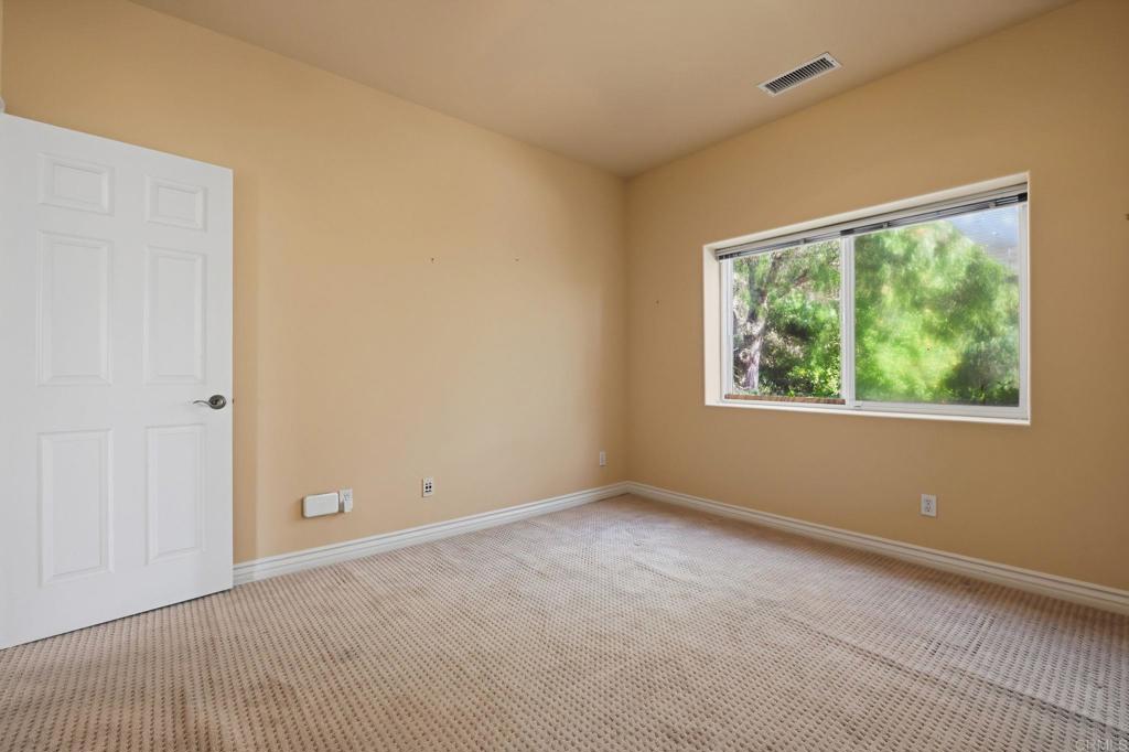 2596 Green Canyon Road Fallbrook, CA 92028 - Photo 38 of 74 a view of an empty room with a window