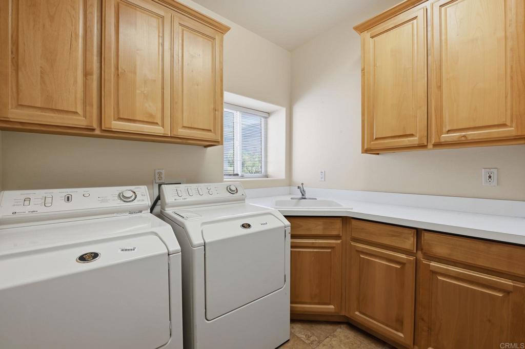 2596 Green Canyon Road Fallbrook, CA 92028 - Photo 48 of 74 a utility room with dryer and washer