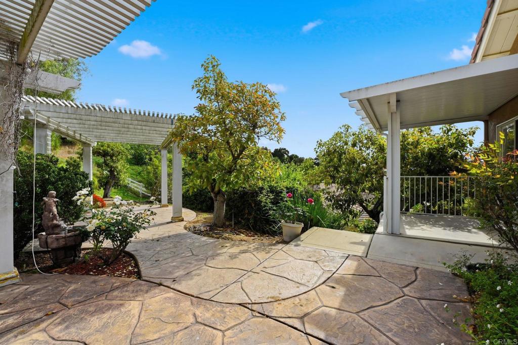 2596 Green Canyon Road Fallbrook, CA 92028 - Photo 55 of 74 a view of a chairs and tables in the patio