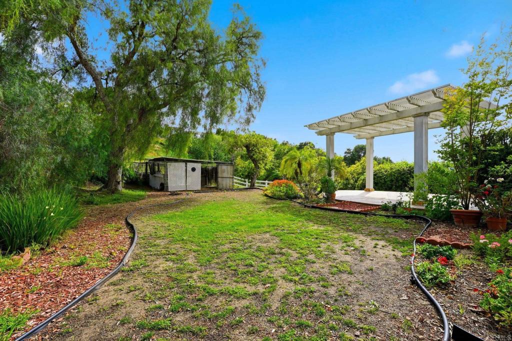 2596 Green Canyon Road Fallbrook, CA 92028 - Photo 58 of 74 a view of a house with backyard and sitting area