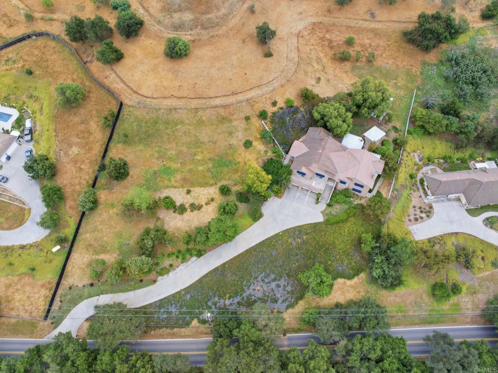 2596 Green Canyon Road Fallbrook, CA 92028 - Photo 70 of 74 an aerial view of residential houses with outdoor space