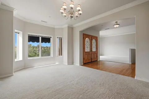 a kitchen with granite countertop a sink and a window