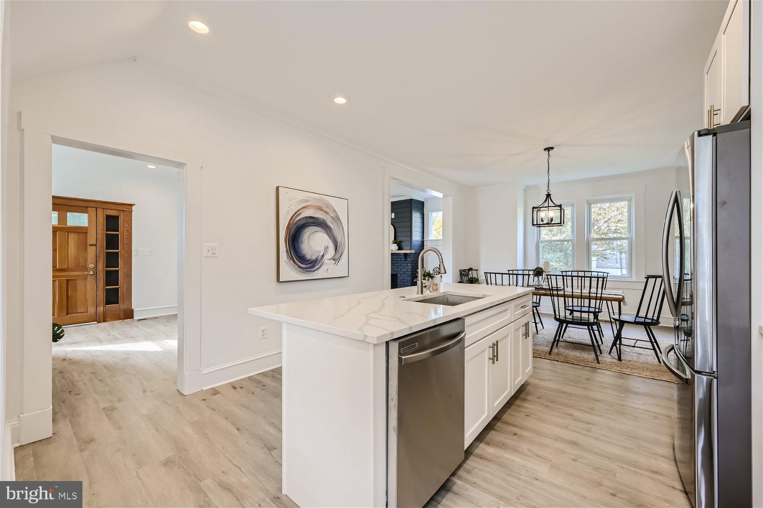 611 Coleraine Road Baltimore, MD 21229 - Photo 17 of 33 a large kitchen with a lot of counter space and wooden floor
