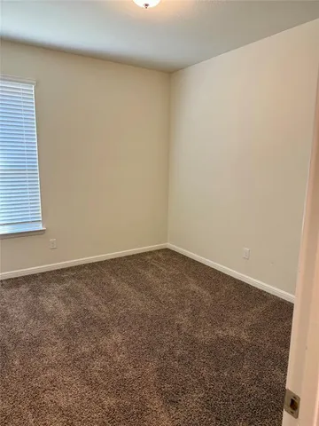 an empty room with a workbench