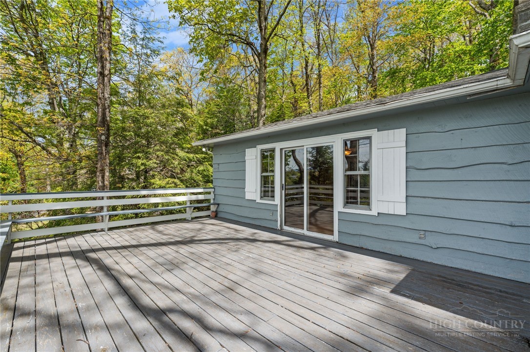 656 Goforth Road Blowing Rock, NC 28605 - Photo 6 of 36 a view of a house with a large window