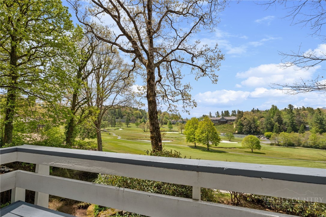 656 Goforth Road Blowing Rock, NC 28605 - Photo 8 of 36 a view of a swimming pool with a yard