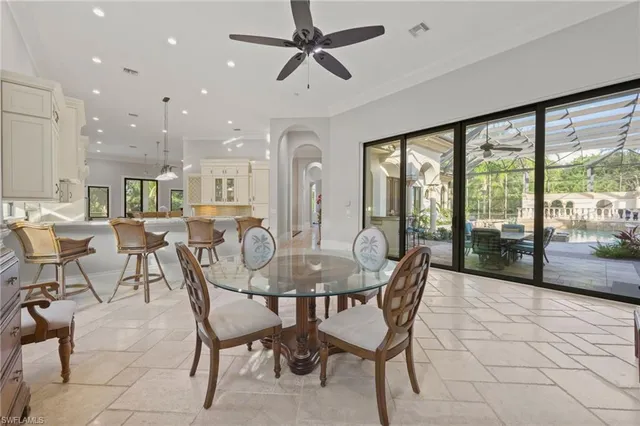 a view of a dining room with furniture window and outside view