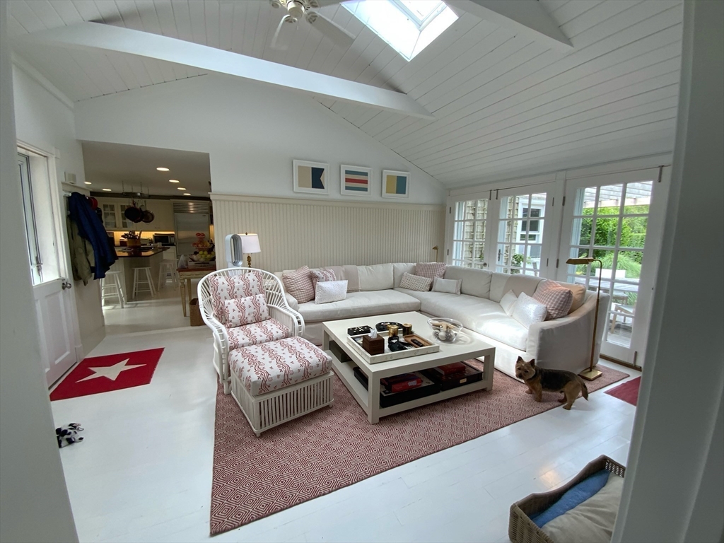 17 Burnell Street Nantucket, MA 02554 - Photo 15 of 24 a living room with furniture and a flat screen tv