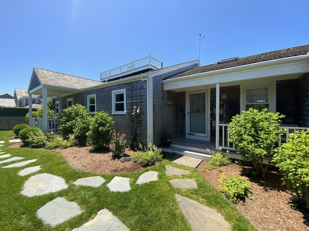 17 Burnell Street Nantucket, MA 02554 - Photo 23 of 24 front view of a house with a yard
