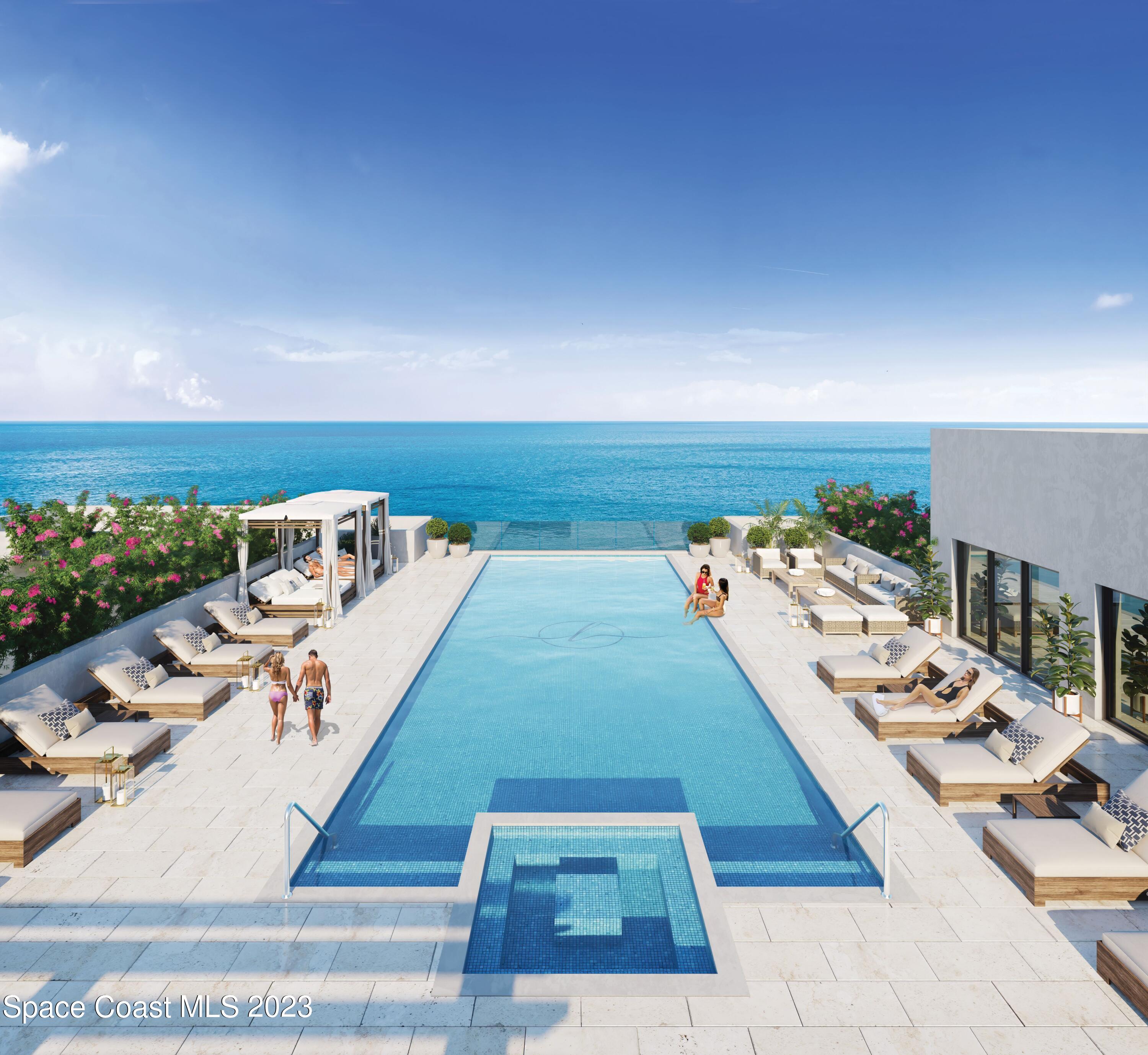 604 Highway A1a Satellite Beach, Unit 902 Satellite Beach, FL 32937 - Photo 2 of 18 view of living room and kitchen