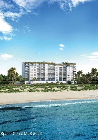 a view of a city with an ocean beach