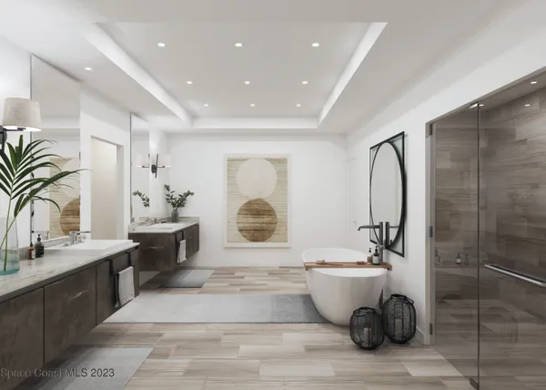 a bathroom with a double vanity sink a mirror and a shower