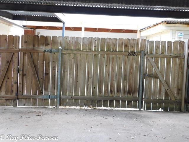 8020 Pines Road Shreveport, LA 71129 - Photo 20 of 24 Two covered parking spaces with your own privacy fence and gate.