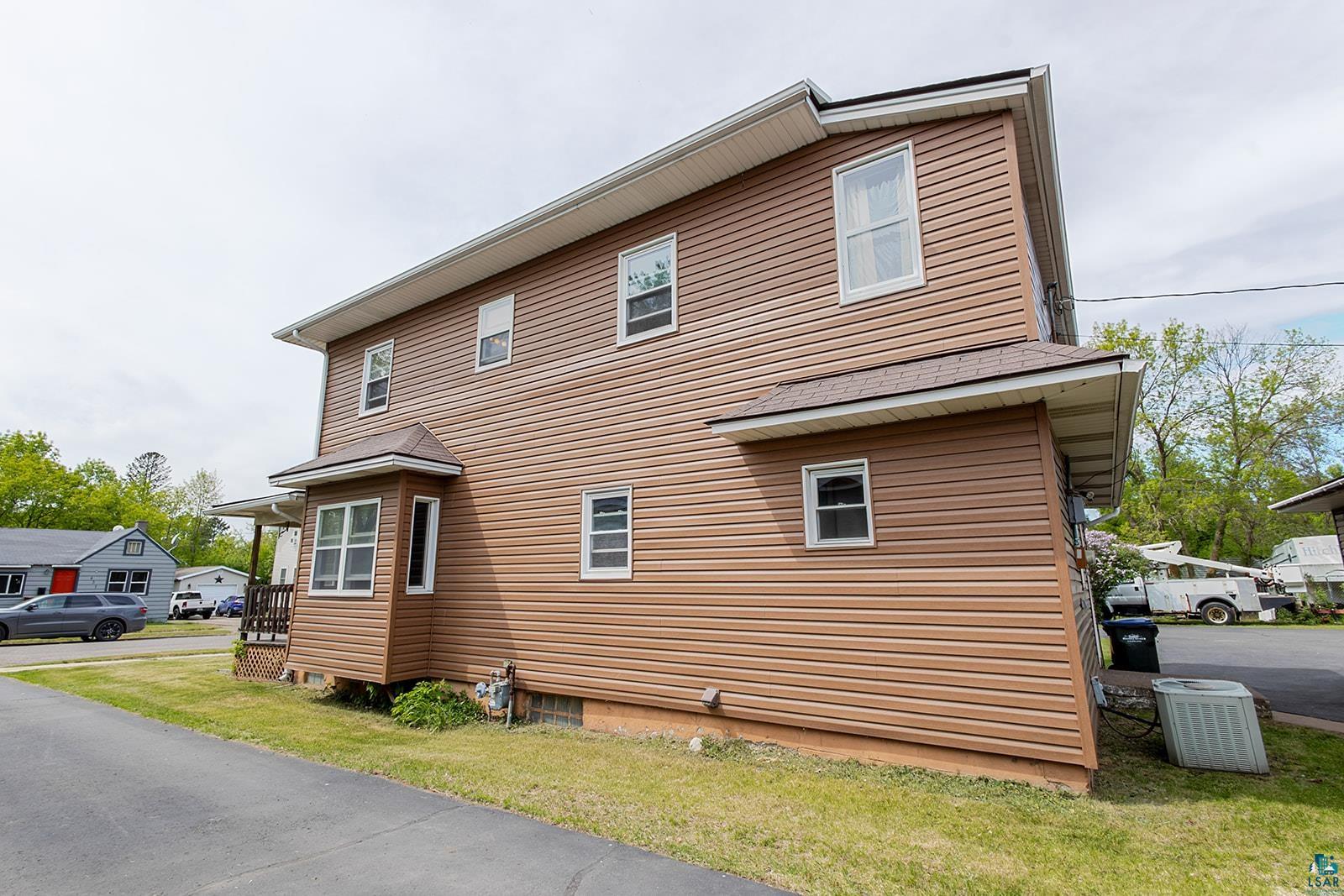 438 9th Street Cloquet, MN 55720 - Photo 6 of 27 Two-story property featuring brown siding and white trim