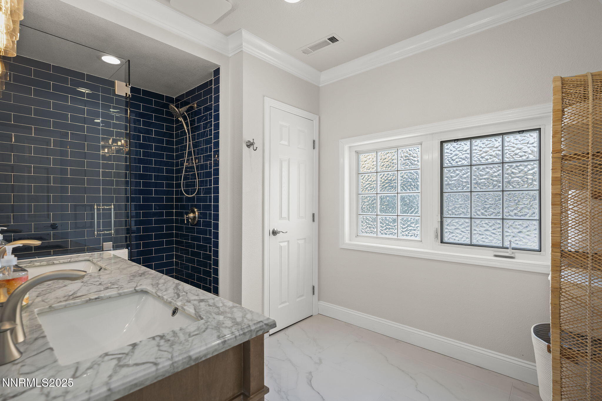 2260 Sunrise Drive Reno, NV 89509 - Photo 20 of 44 a bathroom with a granite countertop sink a toilet and window