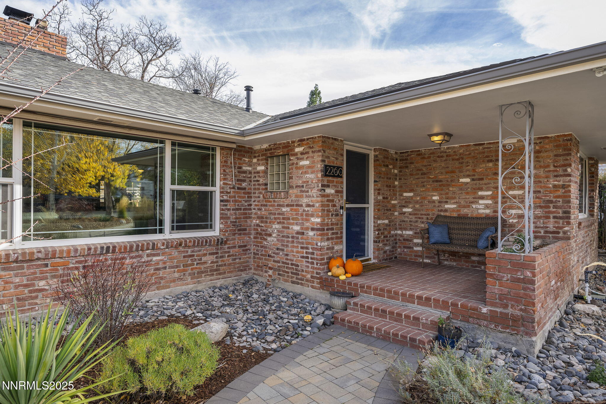 2260 Sunrise Drive Reno, NV 89509 - Photo 3 of 44 a front view of a house with a large window