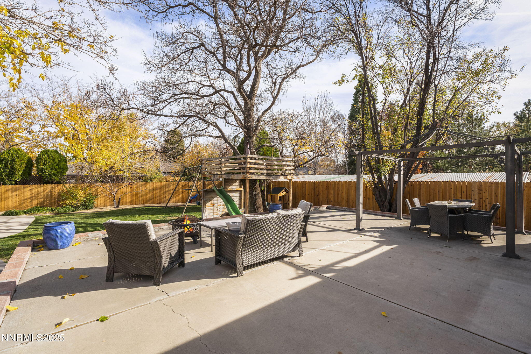 2260 Sunrise Drive Reno, NV 89509 - Photo 32 of 44 a view of a patio with couches and a fire pit