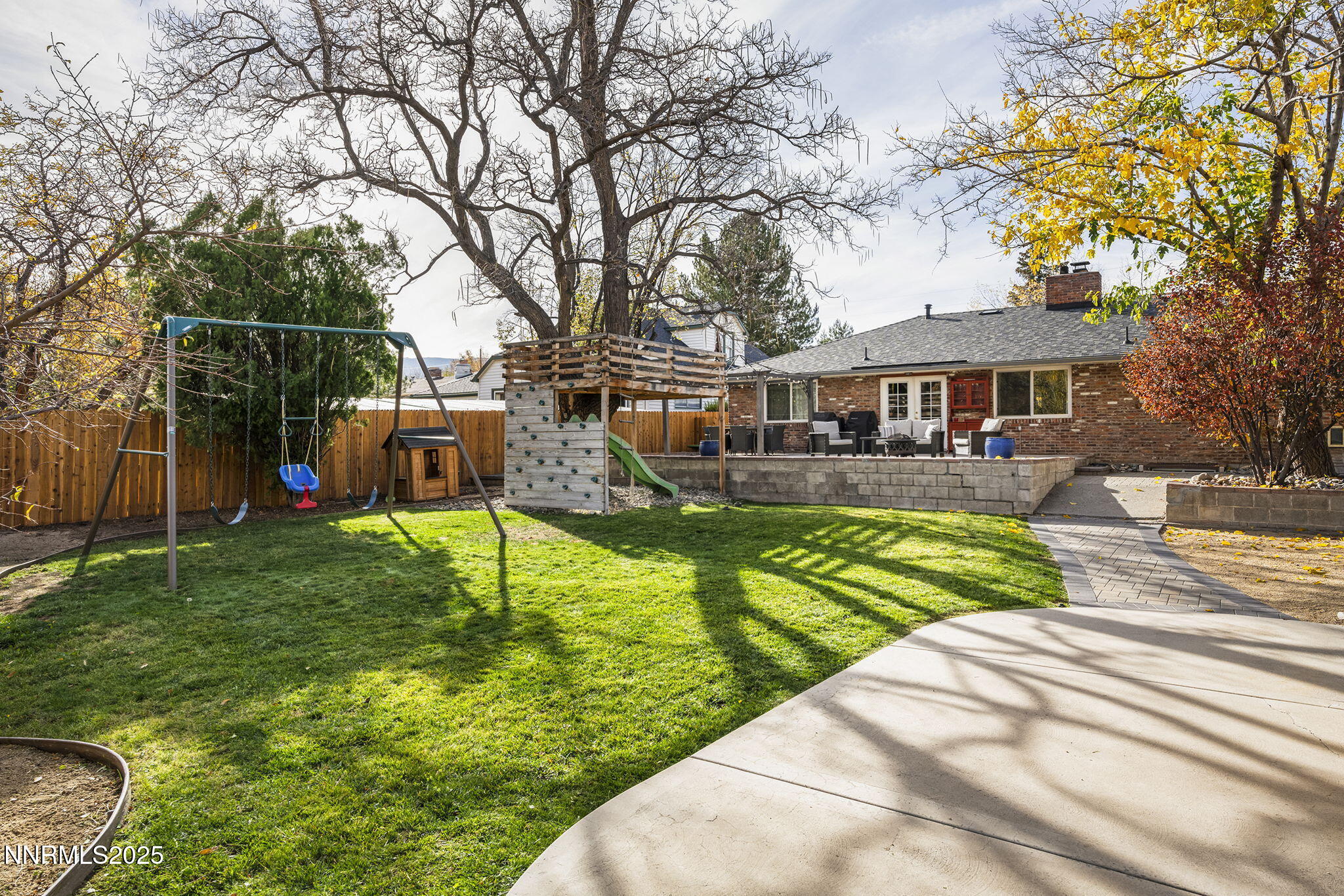 2260 Sunrise Drive Reno, NV 89509 - Photo 37 of 44 a view of house with a big yard plants and large trees