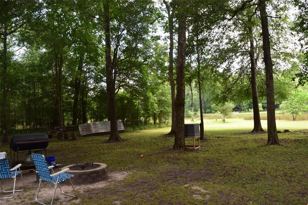 478 Center Drive Cleveland, TX 77327 - Photo 6 of 33 Lots of activities can be accommodated in this lot