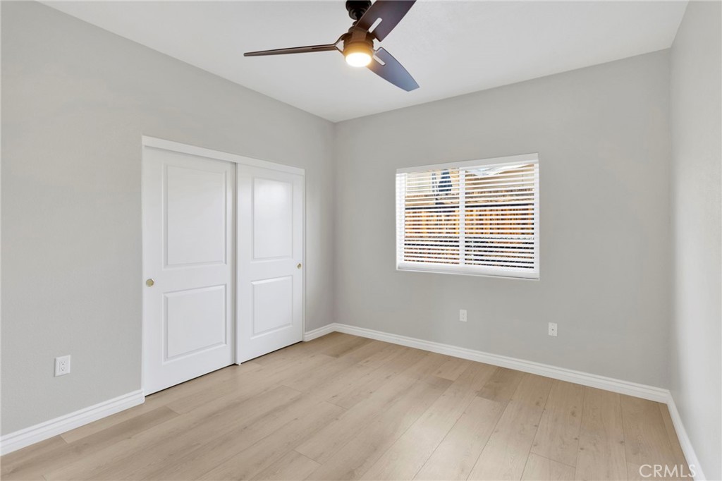 16150 Smoke Tree Street Hesperia, CA 92345 - Photo 18 of 32 a view of an empty room with a window