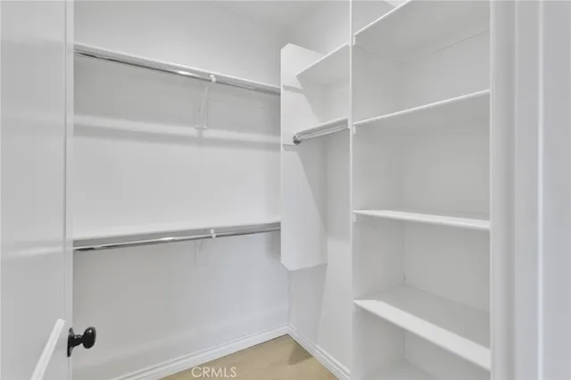 a view of an empty walk in closet